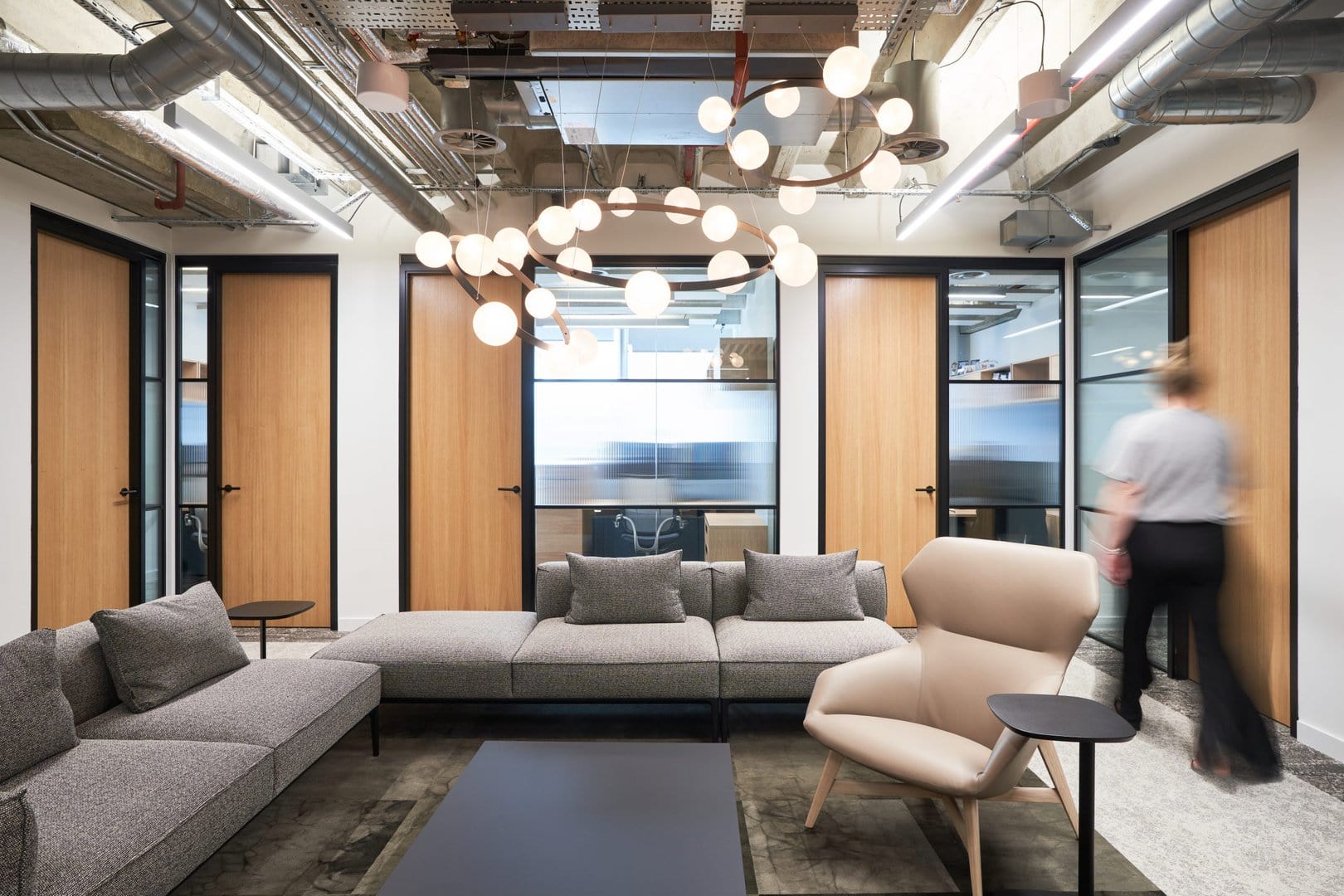 Alston and Bird legal office client waiting area outside a suite of meeting rooms.